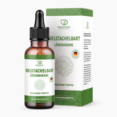 Braune Flasche mit Pipette und Etikett IGELSTACHELBART vor weiß-grün gestalteter Verpackung